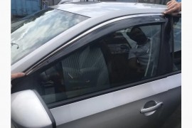 Вітровики вікон Skoda Rapid седан з хром смугою 4шт