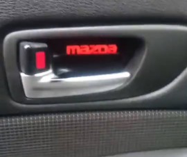 LED подсветка дверных ручек Mazda 5 CR с логотипом