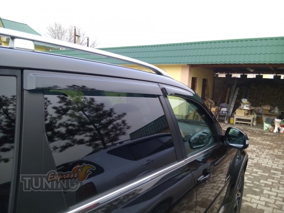 Ветровики на окна Ssangyong Rexton W фото Киев